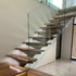 Steel stair with timber treads and glass balustrade
